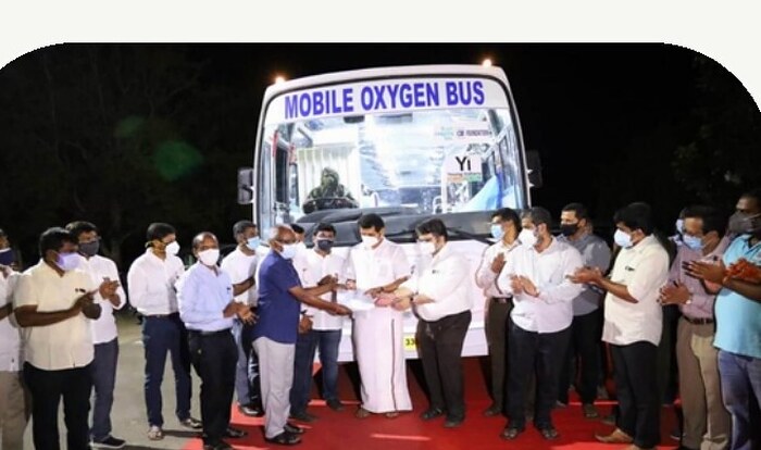 Officials inaugurate SRP Foundation's mobile oxygen bus at a night ceremony.